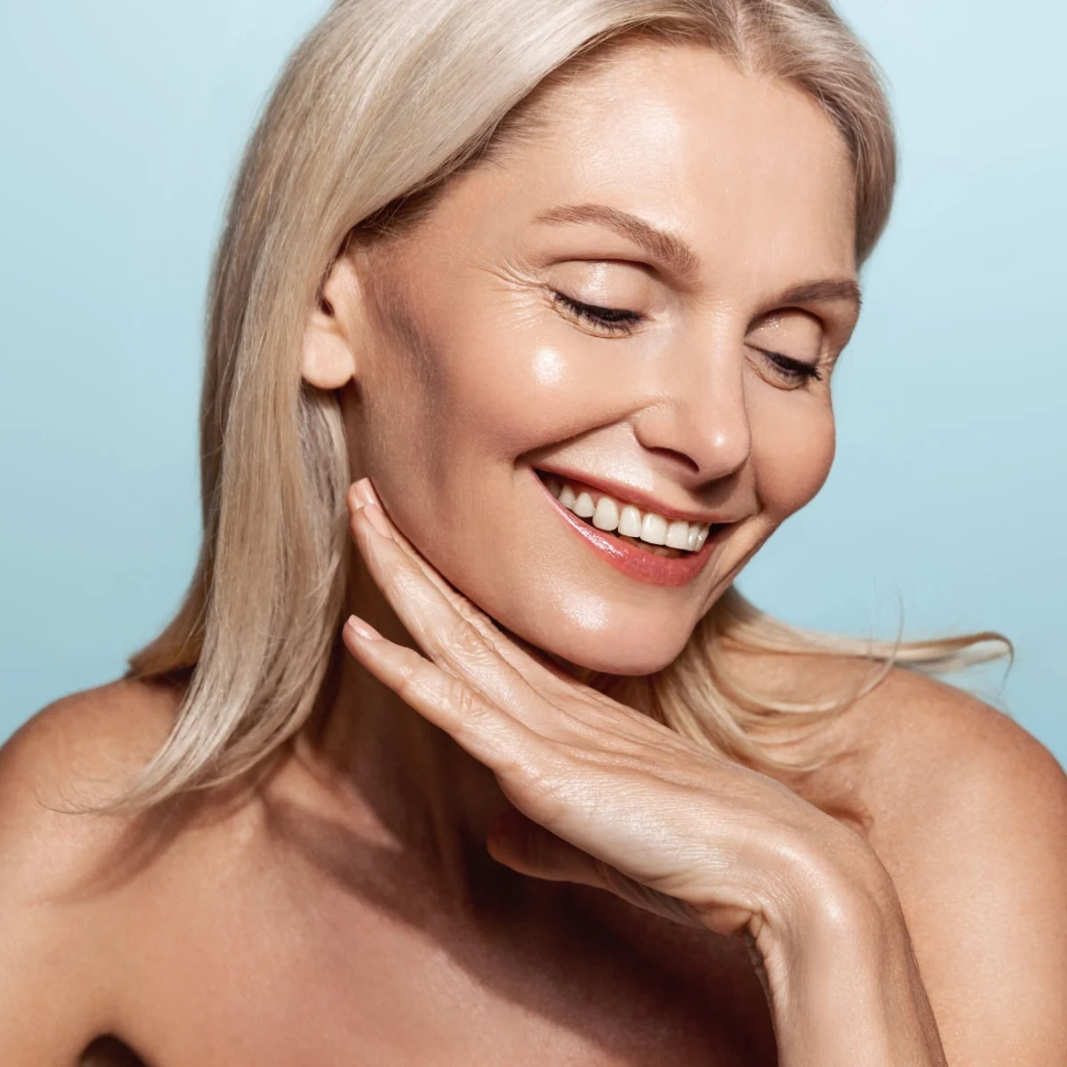 confident senior woman with glowing skin